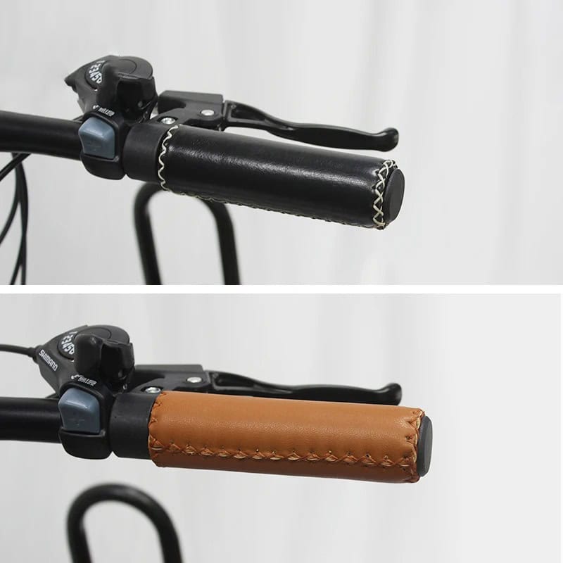 Black leather bicycle handlebar grip with stitching detail, perfect for cycling accessories.