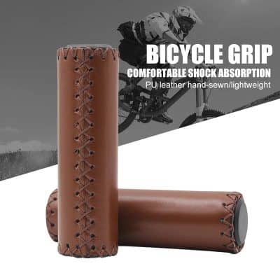 Sturdy brown leather bicycle grip with stitch detailing, offering comfortable shock absorption, lightweight and durable for cycling enthusiasts.
