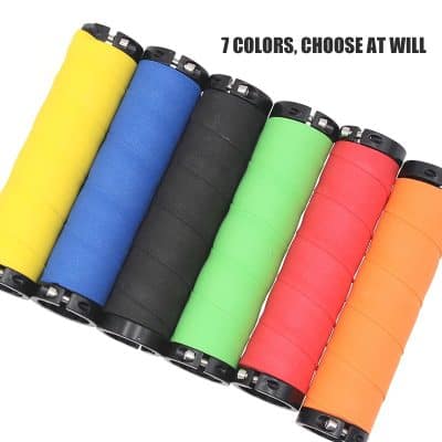 Brightly colored golf club grips in yellow, blue, black, green, red, and orange on a white background, showcasing variety and durability, perfect for enhancing grip and performance.
