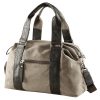 Durable beige travel bag with black leather accents, zipper compartments, and adjustable shoulder strap, perfect for stylish and functional carry-on luggage.