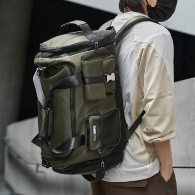 Travel backpack with multiple compartments, suitable for outdoor adventures and commuting.