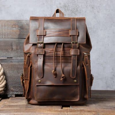 High-quality brown leather backpack with multiple compartments, adjustable straps, and stylish design, perfect for daily use and travel. Ideal for fashion-conscious professionals and students seeking durable, trendy accessories.