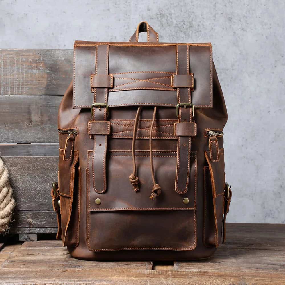High-quality brown leather backpack with multiple compartments, adjustable straps, and stylish design, perfect for daily use and travel. Ideal for fashion-conscious professionals and students seeking durable, trendy accessories.