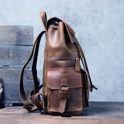Leather backpack for men and women with multiple compartments, stylish and durable. Perfect for work, travel, or everyday use, combining fashion and functionality.