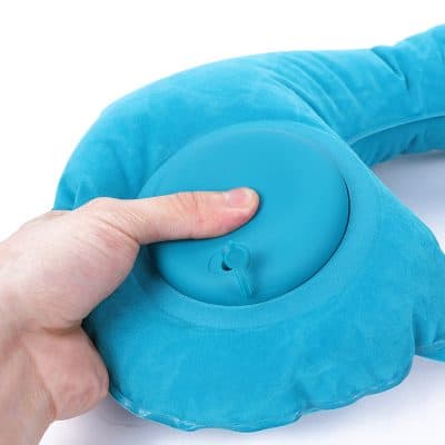 Comfortable blue inflatable pillow for medical and ergonomic support, ideal for travel and rest. Designed for enhanced comfort, portability, and relaxation during trips, flights, or at-home use.