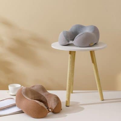 Memory foam travel neck pillow for comfortable support during flights and long journeys, available at Monalisa Medical Store. Perfect for preventing neck strain and ensuring restful travel.