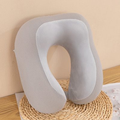 Memory foam travel neck pillow for comfortable support during flights and long car rides.