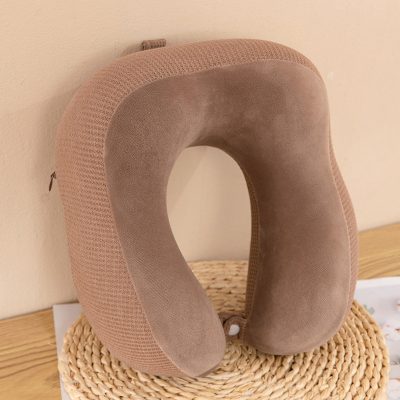 Memory foam travel neck pillow with ergonomic support for comfortable rest during long trips, soft cover, and compact travel size for easy packing and portability.