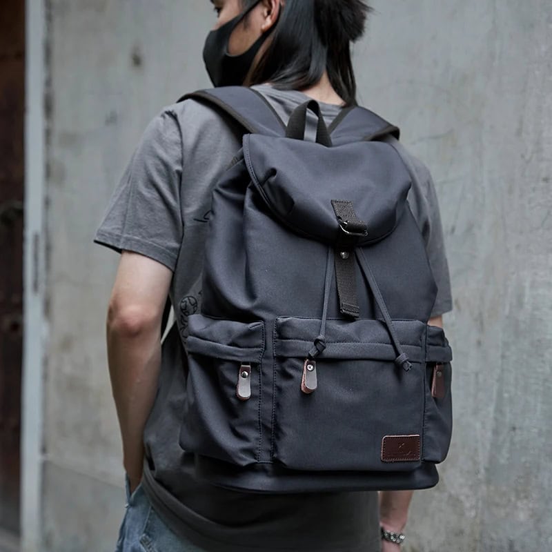 Durable black backpack for everyday use and travel, featuring multiple compartments and ergonomic design to carry essentials comfortably. Perfect for students, commuters, and travelers.