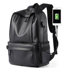 Backpack with built-in USB charging port, black leather, for tech-savvy professionals and travelers.