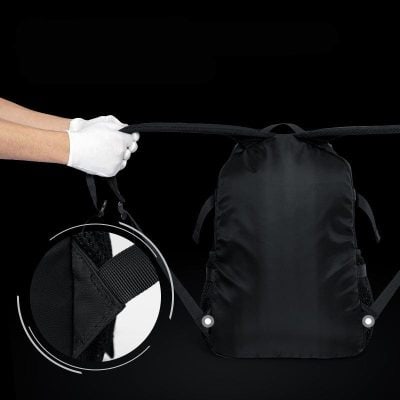 Waterproof black backpack with adjustable straps, designed for travel and daily use, featuring durable construction and ergonomic straps for comfort. Ideal for versatile storage solutions.