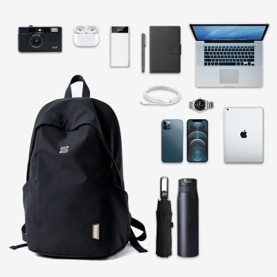 Black laptop backpack with tech gadgets and accessories, perfect for students and professionals. Features laptop compartment, water bottle holder, and multiple pockets for organization. Stylish and functional.