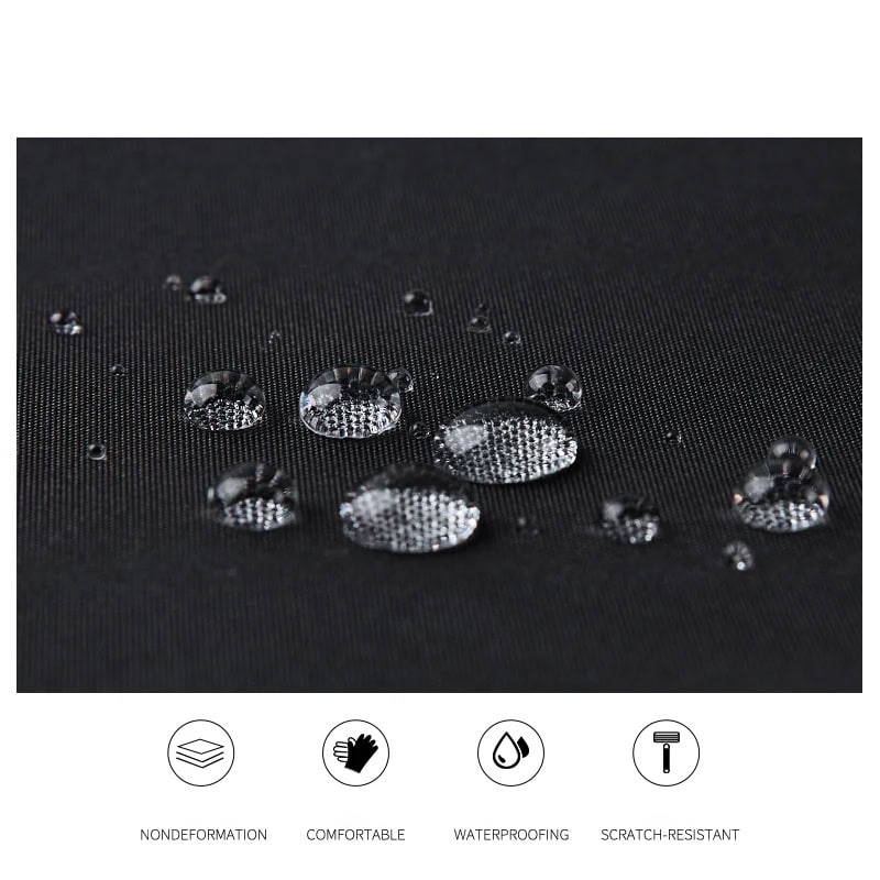 Water-resistant fabric with water droplets on black textile, showcasing durability and waterproof qualities.
