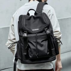 Backpack with multiple compartments, ideal for travel and daily use, featuring durable material and adjustable straps. Perfect for carrying essentials comfortably.