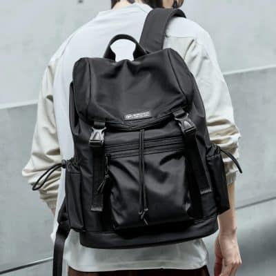Backpack with multiple compartments, ideal for travel and daily use, featuring durable material and adjustable straps. Perfect for carrying essentials comfortably.