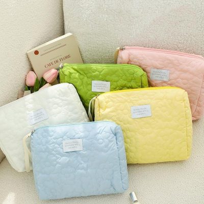 Bright pastel quilted cosmetic bags in pink, green, yellow, white, and blue, ideal for storing beauty essentials, accessories, and small items at Monalisa Store.