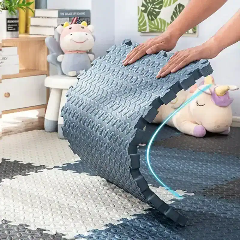 Soft foam puzzle mat with interlocking tiles, perfect for children's playroom or nursery flooring, providing safety and comfort for kids' activities.