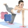 Flexible exercise woman using balance pads for core strength workouts at home or gym.