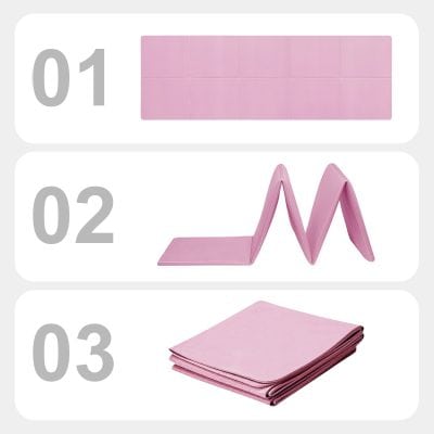 Pink yoga mat, foldable exercise mat, and workout accessories for fitness and physical therapy.