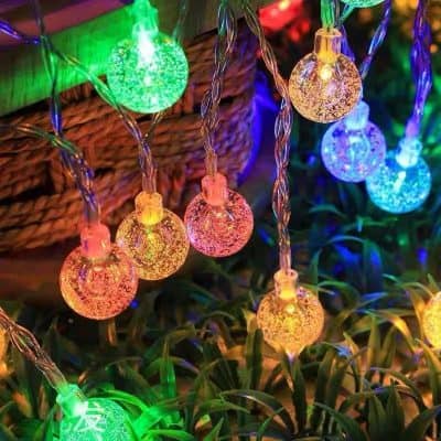 Multicolored decorative string lights perfect for home decor and festive lighting, ideal for enhancing outdoor and indoor spaces.