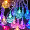 Multicolored LED string lights for interior decor, energy-efficient lighting, festive glow, perfect for homes and events, vibrant multicolor bulbs with clear wiring, creating a cheerful and inviting ambiance on Monalisa Store website.