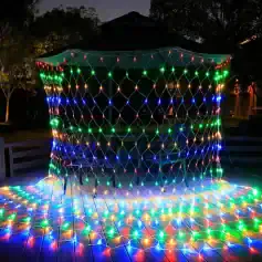 Multicolor LED string lights decorating a gazebo in outdoor setting for festive or holiday ambiance. Perfect for enhancing optical store displays and creating inviting atmosphere.
