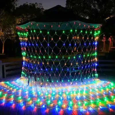 Multicolor LED string lights decorating a gazebo in outdoor setting for festive or holiday ambiance. Perfect for enhancing optical store displays and creating inviting atmosphere.