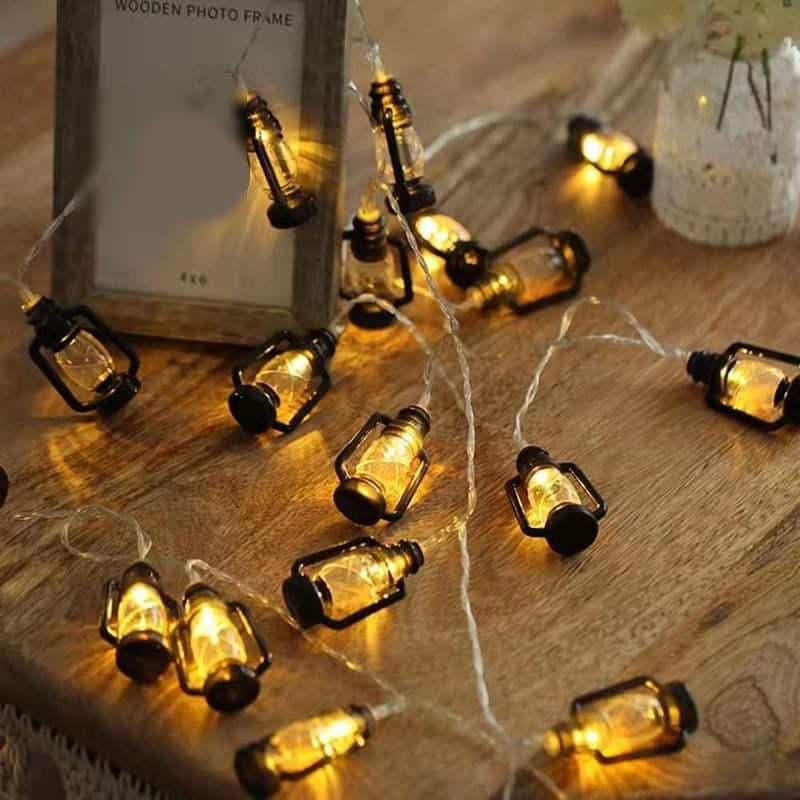 Small jar string lights for ambiance, decorative LED fairy lights, warm yellow glow indoor lighting, perfect for home decor and parties.