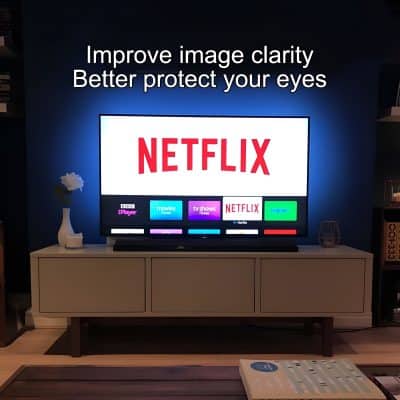 Clear image of a flat-screen TV displaying Netflix with eye protection features, set on a modern TV unit in a cozy living room.