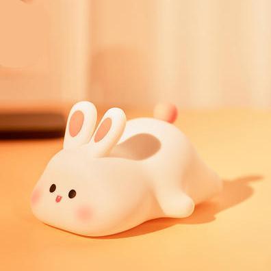 Cute bunny-shaped night light with soft glow, perfect for children’s bedrooms, promoting a cozy and relaxing atmosphere for better sleep.