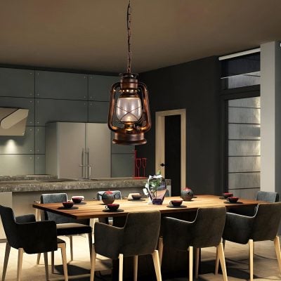 Soft-lit lantern chandelier hanging above a modern dining table with black chairs, cozy indoor dining space with contemporary decor, perfect for family or social gatherings.