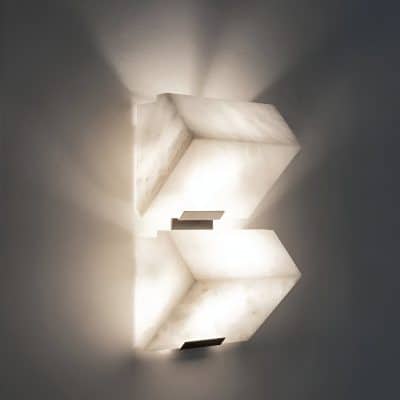 Elegant modern wall-mounted LED light fixture with a sleek rectangular design, providing ambient illumination perfect for medical clinics, salons, or aesthetic treatment centers like Monalisa Store.