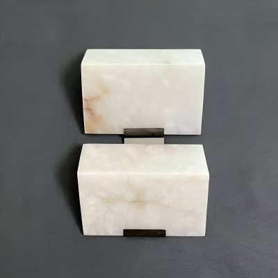 Polished onyx bathroom vanity storage boxes with sleek black handles, perfect for luxury and modern bathroom decor. Elegant onyx material adds sophistication to your space.