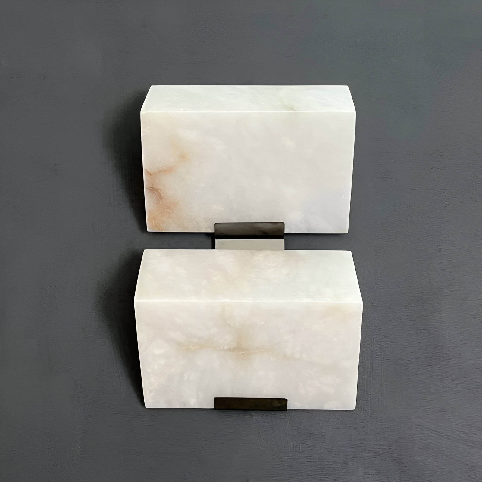 Polished onyx bathroom vanity storage boxes with sleek black handles, perfect for luxury and modern bathroom decor. Elegant onyx material adds sophistication to your space.