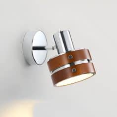 Sleek modern wall-mounted LED light fixture with wooden accents, perfect for contemporary interior decor.
