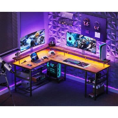 Gaming computer setup with dual monitors, RGB lighting, gaming peripherals, and sound equipment in a modern, illuminated workspace. Perfect for high-performance gaming and streaming.