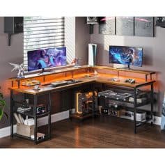 Gaming desk setup with dual monitors, gaming PC, and accessories in modern office. perfect for streamers, esports, or gaming enthusiasts. stylish, functional workspace for gaming and content creation.
