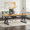 Modern office desk with a wooden top, black metal legs, and ergonomic black swivel chair in a bright, contemporary workspace with natural light and stylish decor.
