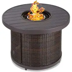 Fire pit table with wicker base and round metal top for outdoor patio decoration.