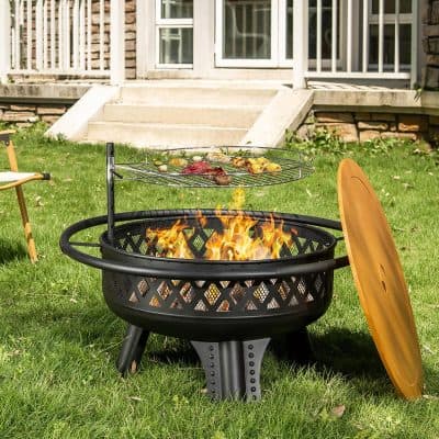 Blazing outdoor fire pit grill with food cooking, perfect for backyard barbecues and outdoor gatherings at Monalisa Store.