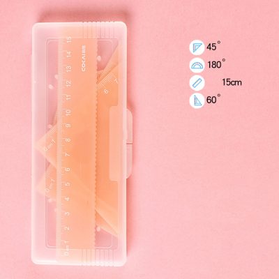 Ruler and geometric tools for salon or makeup artistry on pink background, ideal for beauty, fashion, or cosmetic planning.