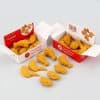 Golden crispy chicken nugget toys in branded fast-food style boxes, perfect for fun, faux fast-food play or decorations. Bright yellow, realistic chicken shapes with fresh flavor theme, ideal for kids' parties or retail displays.