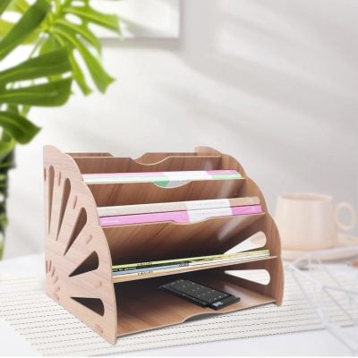 A stylish wooden desk organizer holding various papers, documents, and a remote control, ideal for office or home workspace organization.