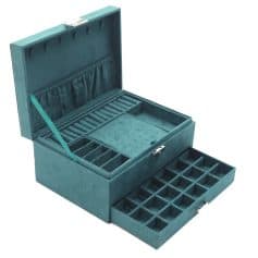 Luxurious teal velvet jewelry organizer with multiple compartments and drawers for rings, necklaces, and bracelets, ideal for elegant display and safekeeping.