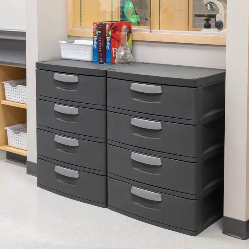 Dark gray plastic storage drawers with ergonomic handles, ideal for organizing medical supplies in healthcare settings, clinics, and hospitals.