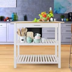 A stylish kitchen produce stand holding fresh vegetables, olive oil, utensils, and dishware, perfect for organization and display in a contemporary kitchen environment.
