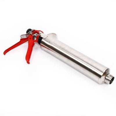 A professional-grade caulking gun with a stainless steel barrel and red handle, ideal for precise application of sealants and adhesives in construction and home improvement projects.