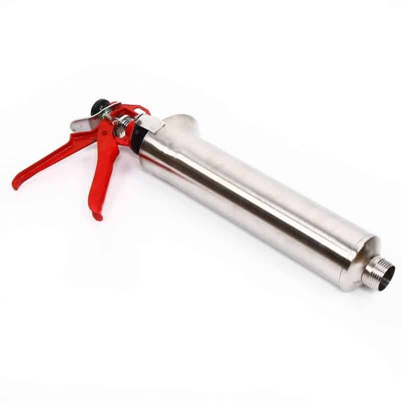 A professional-grade caulking gun with a stainless steel barrel and red handle, ideal for precise application of sealants and adhesives in construction and home improvement projects.