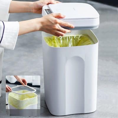 Smart trash bin with foot pedal and lid for easy waste disposal.