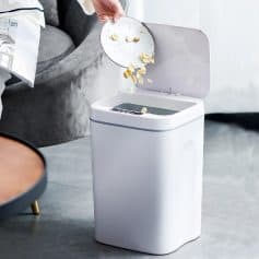 A modern, compact trash bin with a lid and auto-sensing feature, ideal for organized homes and offices. Perfect for efficient waste disposal with advanced technology.